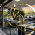 Graphictac mirror-like gold chrome bubble-free printable vinyl used for retail window graphics