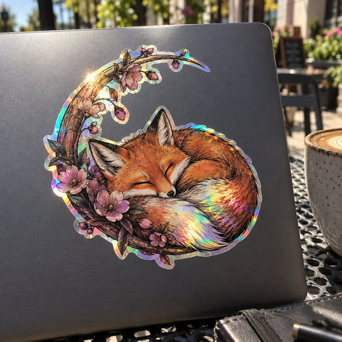 AI application concept — Rainbow holographic printable vinyl: Printed fox holographic sticker on a laptop in sunlight