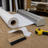 Graphictac 10mil anti-curl roll-up banner media installed into a retractable banner stand base
